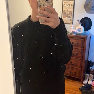 Crew neck sweater with embellishments